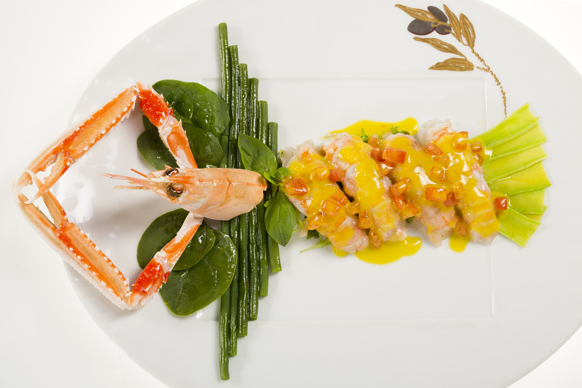 Le papillon de langoustines Jacques Chibois en émulsion de pulpe d'orange à l'huile d'olive et au basilic